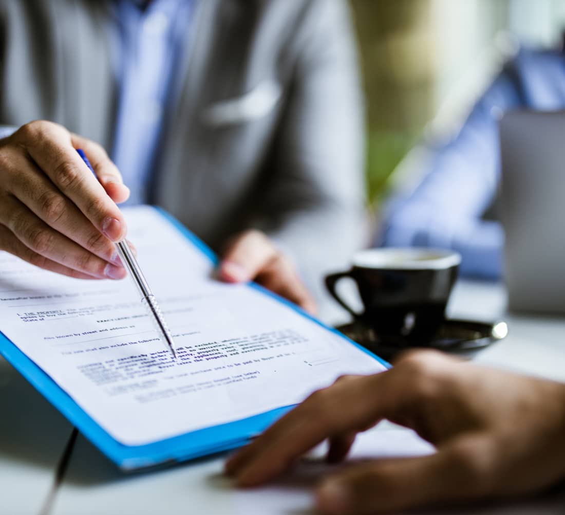 Contract documents being reviewed